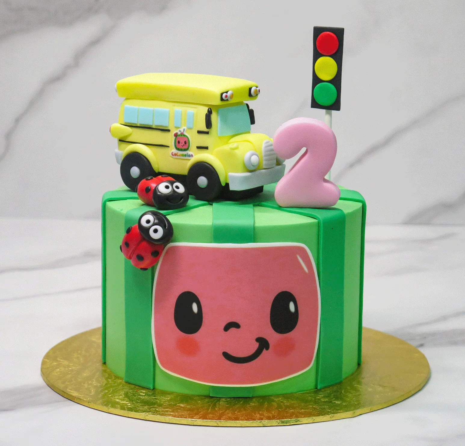 CoComelon School Bus Inspired Cake