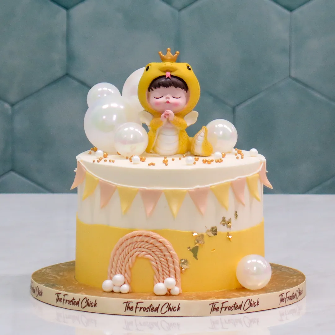 Sleeping Baby in Snake Suit Cake