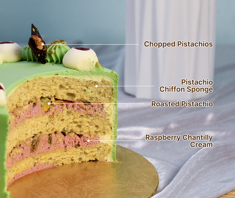 Pistachio raspberry fresh cream cake slice