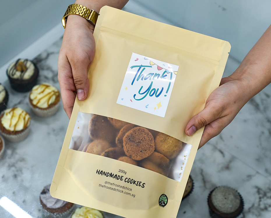 staff giving cookie pack