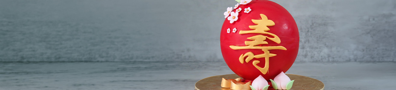 shou longevity chocolate pinata cake