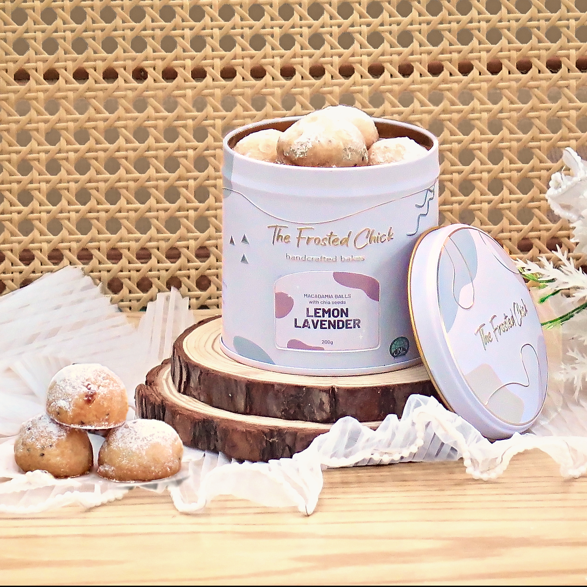 Lemon Lavender Macadamia Snowball Cookies in an open tin – The Frosted Chick