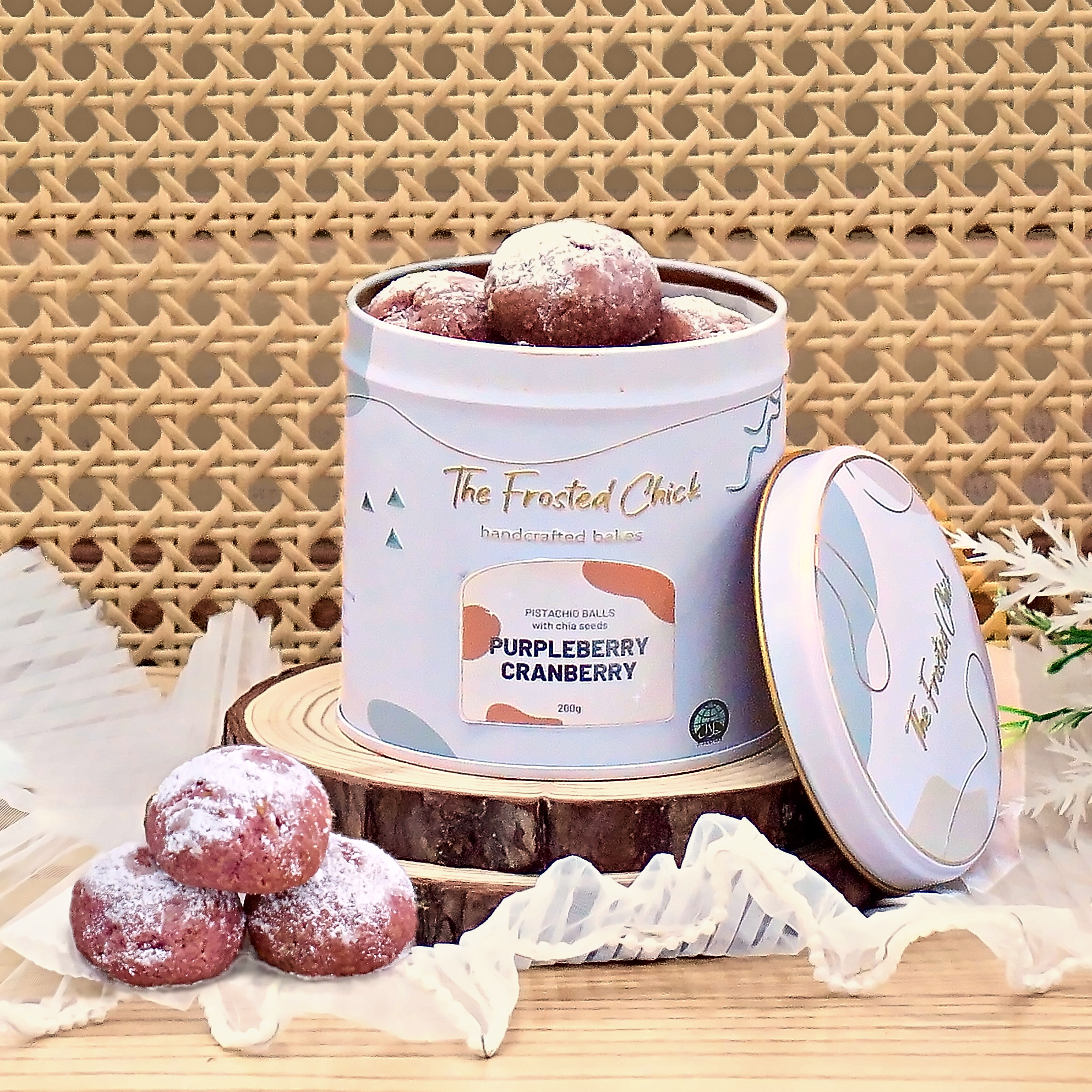 Purpleberry Cranberry Pistachio Snowball Cookies in an open tin – The Frosted Chick